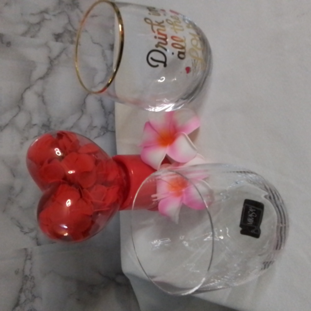 Set of two glass stem less wine glasses